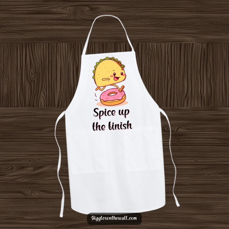 Funny apron depicting a taco runner tripping over a donut during a marathon, ideal for kitchen humor.